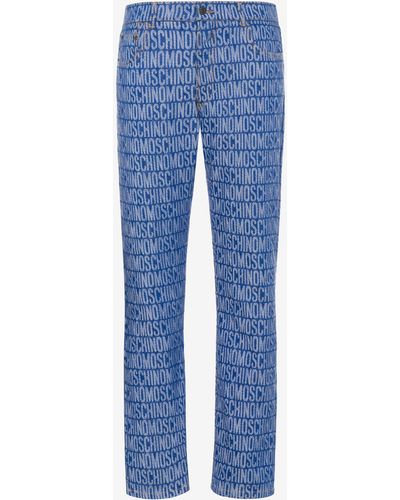Moschino Pantalon En Denim Jacquard Allover Logo - Bleu
