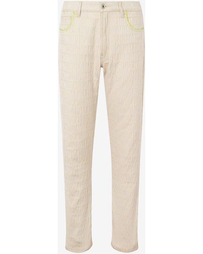 Moschino Allover Logo Cotton And Viscose Blend Trousers - Natural