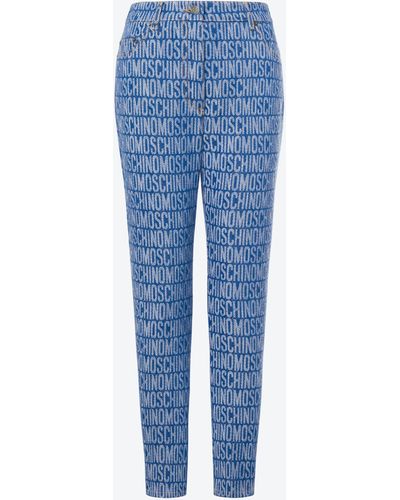 Moschino Pantalon En Denim Allover Logo - Bleu