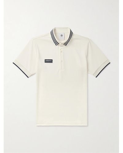 adidas Originals Polo in jersey con righe e logo applicato - Neutro