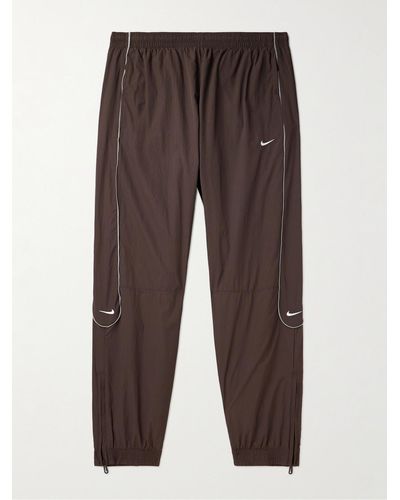 Nike Solo Swoosh Tapered Logo-embroidered Nylon Track Trousers - Brown