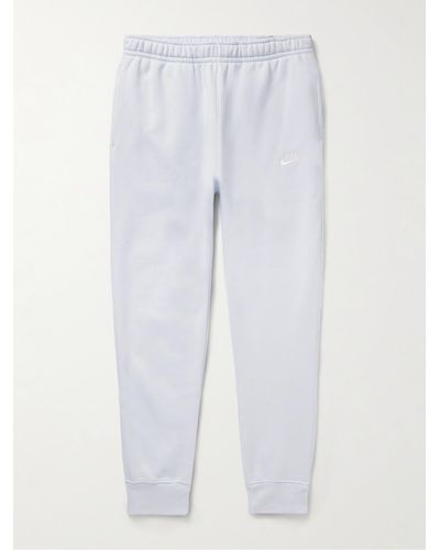 Nike Pantaloni sportivi a gamba affusolata in jersey di misto cotone con logo ricamato Sportswear Club - Bianco