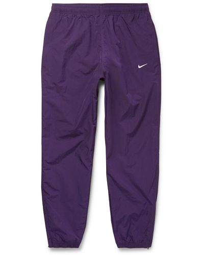 Nike Nrg Tapered Logo-embroidered Shell Track Trousers - Purple