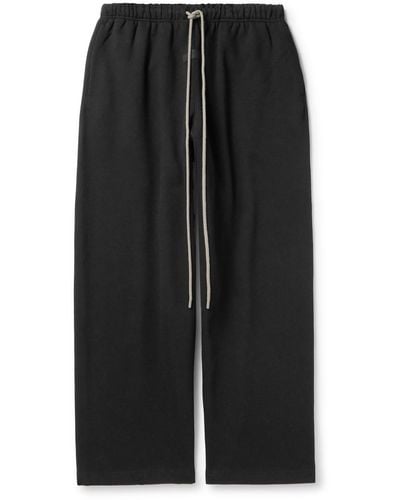 Fear Of God Wide-leg Logo-appliquéd Cotton-blend Jersey Sweatpants - Black