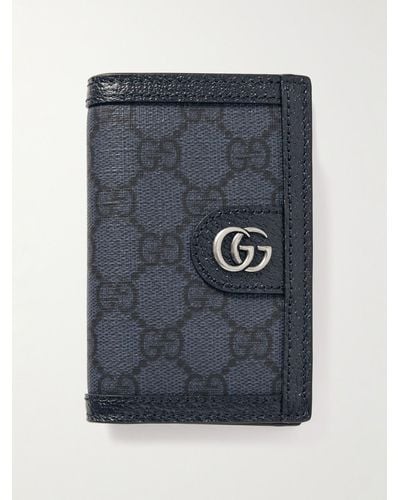 Gucci Aufklappbares Kartenetui aus beschichtetem Canvas mit Lederbesatz und Logomuster - Blau