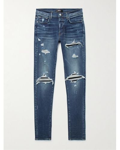 Amiri MX1 Skinny Jeans mit Einsätzen in Distressed-Optik - Blau