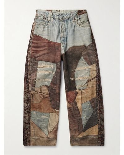 Acne Studios Jeans a gamba larga in denim trompe l'oeil - Grigio