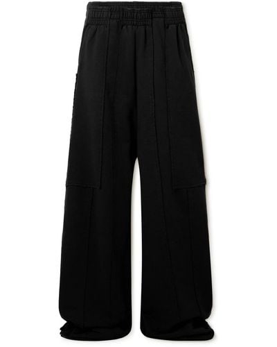 Vetements Wide-leg Paneled Cotton-blend Jersey Sweatpants - Black