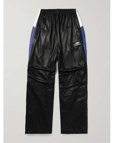 Balenciaga Gerade geschnittene Jogginghose aus Leder mit Streifen - Schwarz