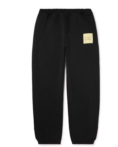 Vetements Tapered Logo-print Cotton-blend Jersey Sweatpants - Black