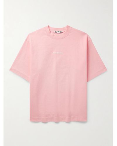 Acne Studios T-shirt in jersey di cotone tinta in capo con logo floccato Extorr - Rosa