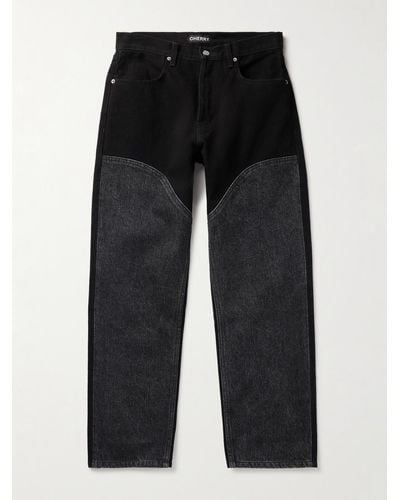 CHERRY LA Chap gerade geschnittene Jeans mit Einsätzen - Schwarz