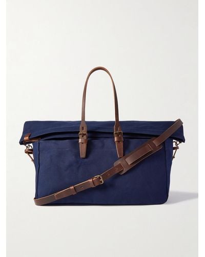 Bleu De Chauffe Cabine Reisetasche aus Baumwoll-Canvas mit Lederbesatz - Blau