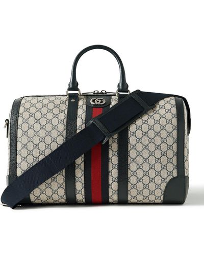 Gucci Savoy Leather- And Webbing-trimmed Monogrammed Supreme Coated-canvas Duffle Bag - Blue