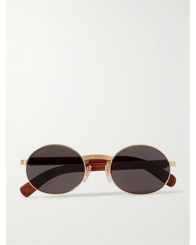 Cartier Première goldfarbene Sonnenbrille mit rundem Rahmen und Holzbügeln - Braun