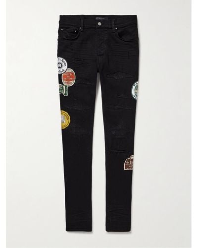 Amiri Skinny-fit Appliquéd Distressed Jeans - Black