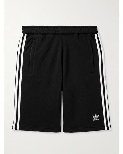 adidas Originals Shorts a gamba dritta in jersey di cotone con righe e logo ricamato Adicolor - Nero