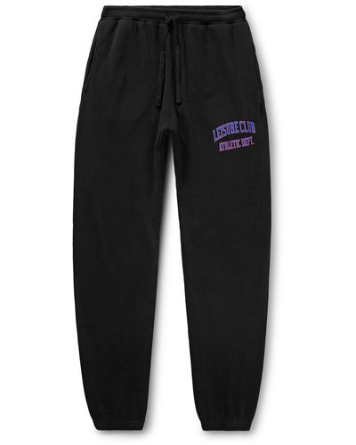 Pasadena Leisure Club Athletic Dept. Tapered Logo-print Garment-dyed Cotton-jersey Sweatpants - Black