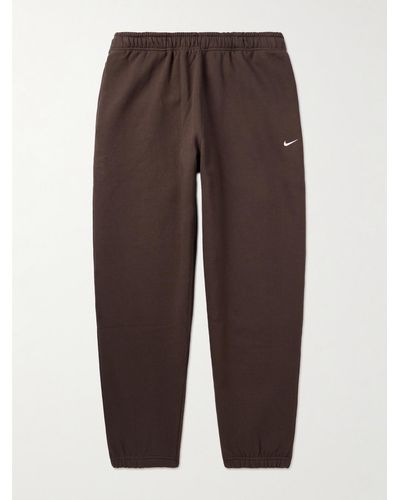 Nike Solo Swoosh Tapered Logo-embroidered Cotton-blend Jersey Joggers - Brown