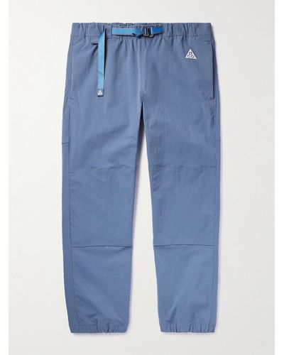 Nike Pantaloni in shell stretch con logo ricamato ACG Trail - Blu