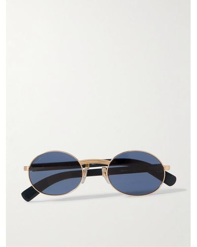 Cartier Première goldfarbene Sonnenbrille mit rundem Rahmen und Holzbügeln - Blau