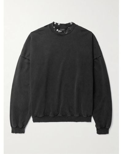 Balenciaga Sweatshirt aus Baumwoll-Jersey mit Piercings in Distressed-Optik - Schwarz