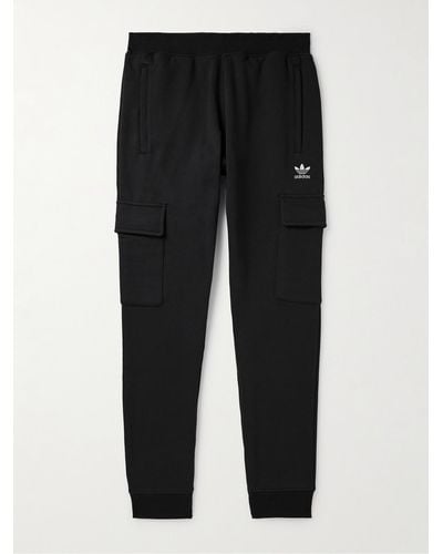adidas Originals Pantaloni sportivi cargo a gamba affusolata in jersey di misto cotone Essentials - Nero