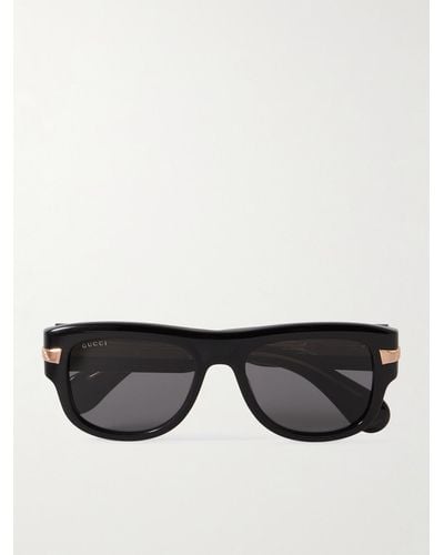 Gucci Sonnenbrille mit eckigem Rahmen aus Azetat mit goldfarbenen Details - Schwarz