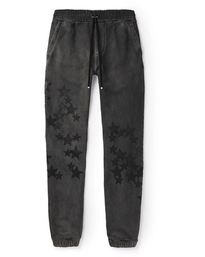 Amiri Pigment Spray Star Tapered Leather-trimmed Cotton-jersey Sweatpants - Gray