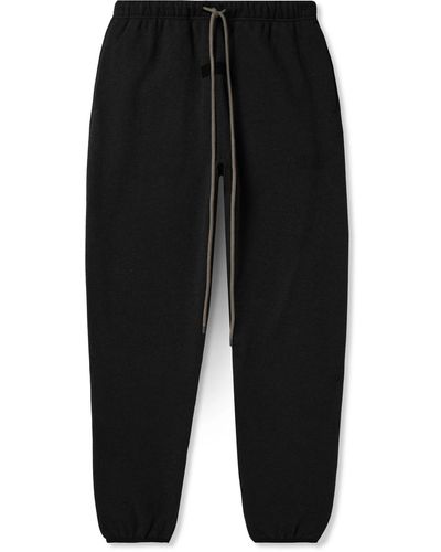 Fear Of God Logo-appliquéd Cotton-blend Jersey Sweatpants - Black