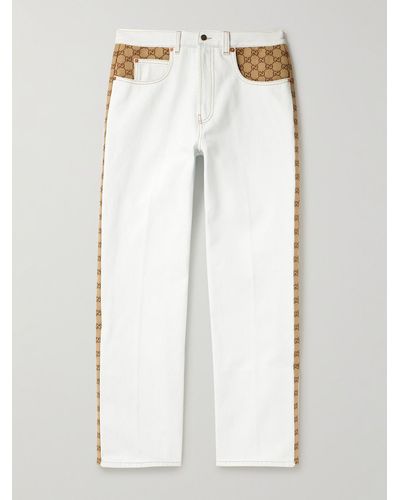 Gucci Gerade geschnittene Jeans aus Denim und Canvas mit Logomuster - Weiß