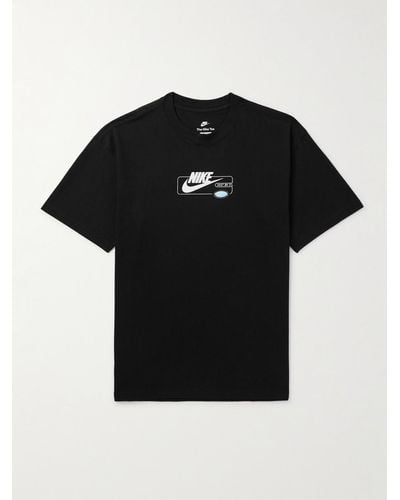 Nike T-Shirt aus Baumwoll-Jersey mit Logoprint und Applikation - Schwarz