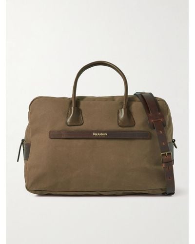Bleu De Chauffe Zephir Leather-trimmed Coated-canvas Holdall - Brown