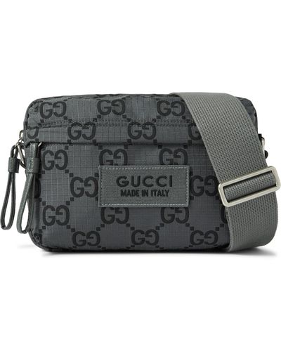 Gucci Leather-trimmed Logo-appliquéd Monogrammed Ripstop Messenger Bag - Black