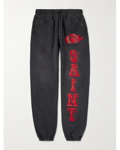 SAINT Mxxxxxx Angel Of Death Tapered Logo-print Cotton-jersey Sweatpants - Blue