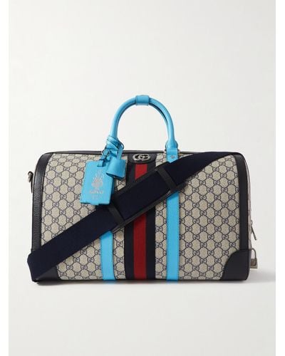 Gucci Savoy Leather-trimmed Monogrammed Coated-canvas Duffle Bag - Blue