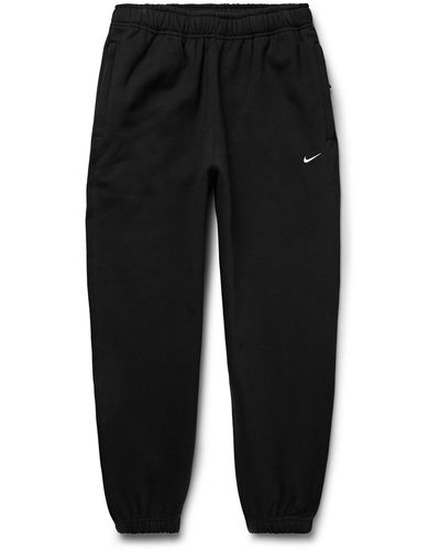 Nike Solo Swoosh Tapered Logo-embroidered Cotton-blend Jersey Sweatpants - Black