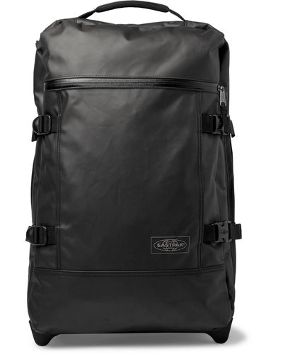Eastpak Tranverz S 51cm Leather-trimmed Coated-canvas Carry-on Suitcase - Black