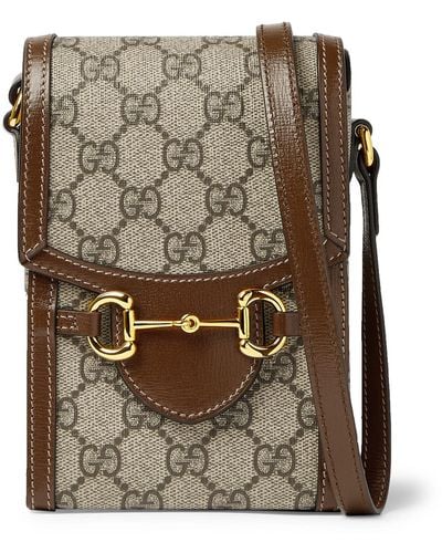 Gucci Horsebit Leather-trimmed Monogrammed Coated-canvas Pouch - Brown