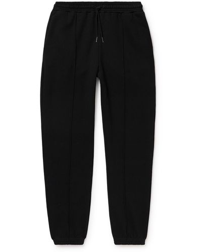 NINETY PERCENT Tapered Organic Cotton-jersey Drawstring Sweatpants - Black