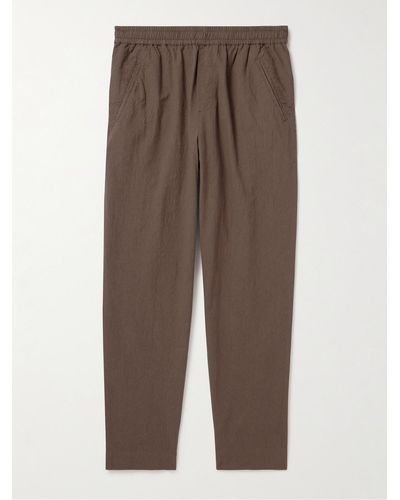 Folk Assembly Tapered Crinkled-cotton Trousers - Brown