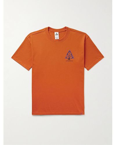 Nike ACG Wildwood T-Shirt aus "Dri-FIT"-Material mit Logoprint - Orange