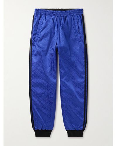 Moncler Genius Adidas Originals Pantaloni sportivi a gamba dritta reversibili in shell con imbottitura e logo jacquard - Blu