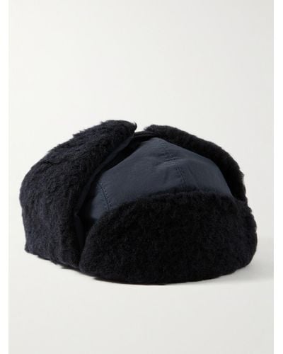 A Kind Of Guise Khoni Trapper-Mütze aus recyceltem Nylon und Fleece aus einer Woll-Baumwollmischung - Schwarz