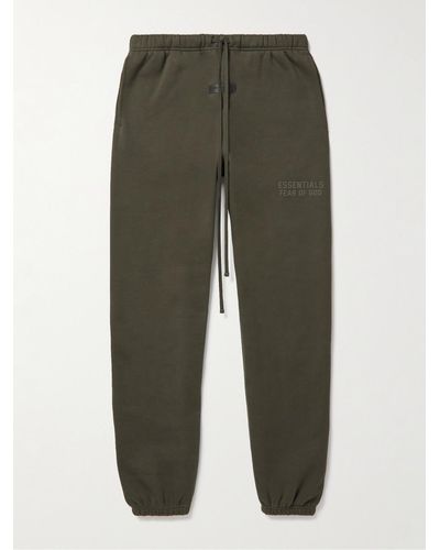 Fear Of God Tapered Logo-appliquéd Cotton-blend Jersey Joggers - Green