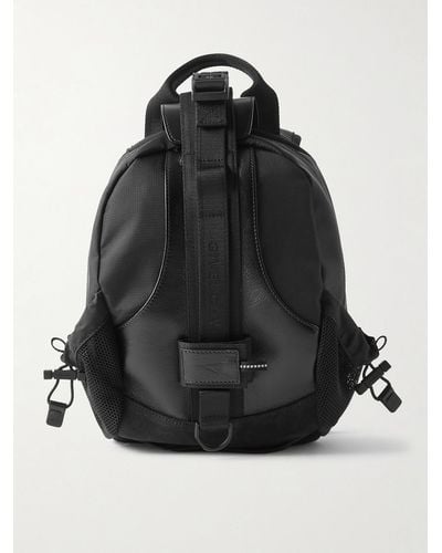 Givenchy G-Trail kleiner Rucksack aus vollnarbigem Leder und Ripstop mit Velourslederbesatz - Schwarz