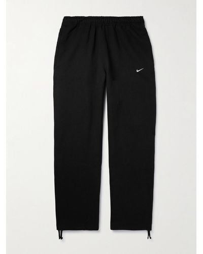 Nike Pantaloni sportivi a gamba dritta in jersey di misto cotone con logo ricamato - Nero