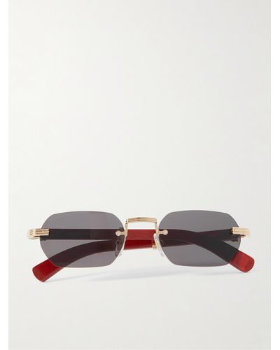 Cartier Rahmenlose Sonnenbrille mit Holzbügeln und goldfarbenen Details - Rot