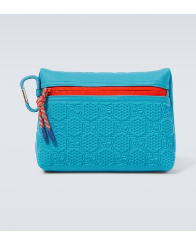 Gucci Small Embossed GG Pouch - Blue