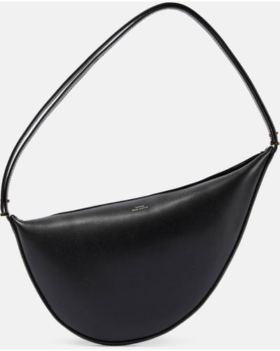 Totême Scooped Leather Shoulder Bag - Black